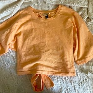 Universal thread cropped t shirt with tie back detail